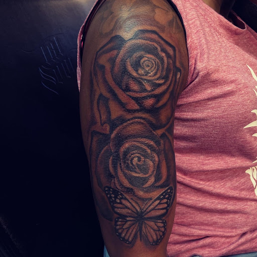 Explore tattoos ideas for men cross, creative tattoo ideas in Miami, available at Ink Rising Tattoo