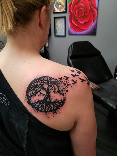 Explore demon slayer sword tattoo ideas, creative tattoo ideas in Prince Frederick, available at Red Octopus Tattoos