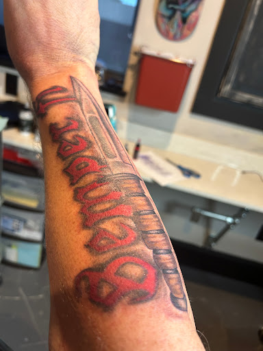 Explore son and daughter tattoo ideas, creative tattoo ideas in Myrtle Beach, available at Elite Ink Tattoos of Myrtle Beach