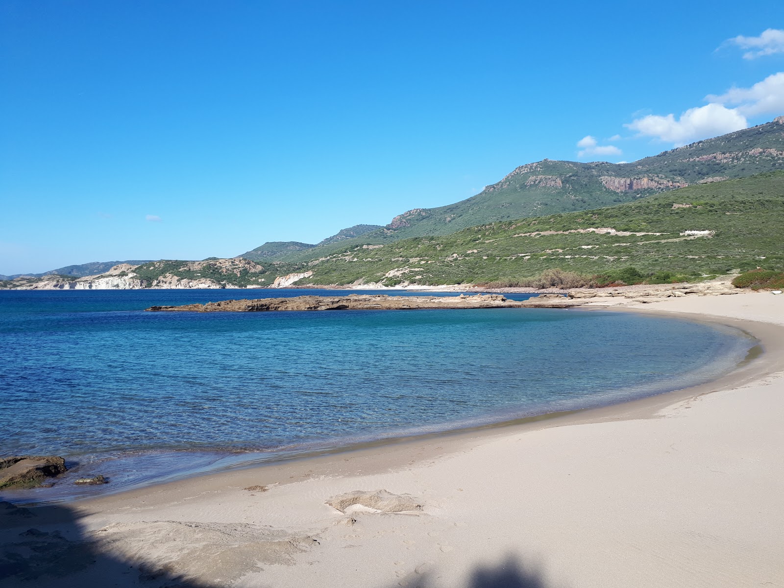 Photo of Spiaggia di S'Abba Druche with partly clean level of cleanliness