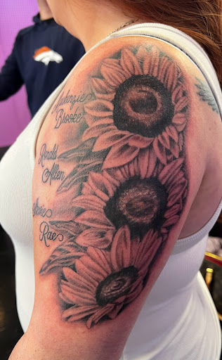 Explore blackout hand tattoo ideas, creative tattoo ideas in Barberton, available at Magic City Tattoo Company