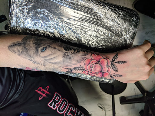 Explore tattoo of child's name ideas, creative tattoo ideas in Pearland, available at Black List Tattoo & Piercing Co.