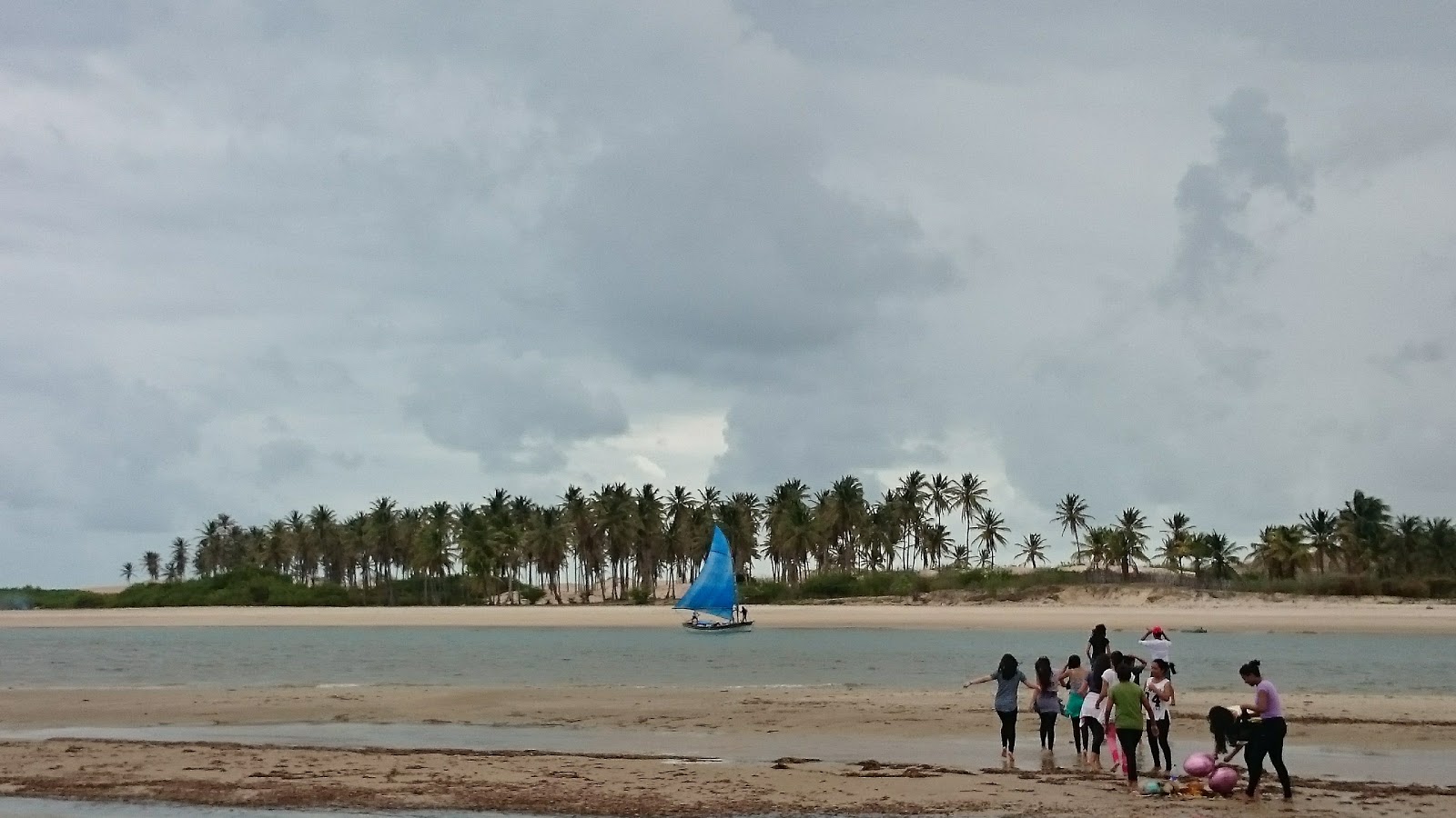 Foto av Praia de Torroes med ljus sand yta