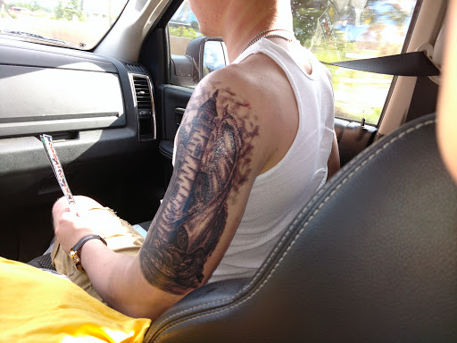Explore american flag forearm tattoo ideas, creative tattoo ideas in Saint Augustine, available at Sailor Chers Tattoo & Body Piercing