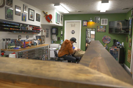 Explore pink panther tattoo ideas, creative tattoo ideas in Terre Haute, available at Marcus Large Tattoo Studio