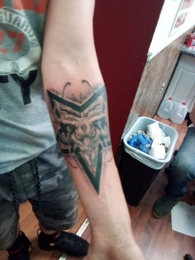 Explore medusa thigh tattoo ideas, creative tattoo ideas in Altoona, available at Black Dragon Tattoo