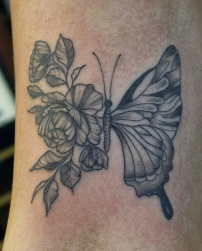 Explore calla lily tattoo ideas, creative tattoo ideas in Honolulu, available at Aloha Tattoo Waikiki Hilton Hawaiian Village Rainbow Bazaar