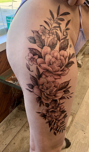 Explore dark tattoo sleeve ideas, creative tattoo ideas in Des Moines, available at Skin Kitchen Tattoo