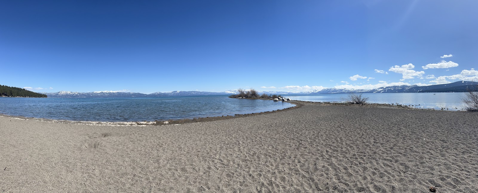 Photo of Lake Forest Beach with gray sand &  rocks surface