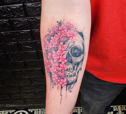 Explore leg flower tattoo ideas, creative tattoo ideas in Kenosha, available at Kenosha Tattoo Company