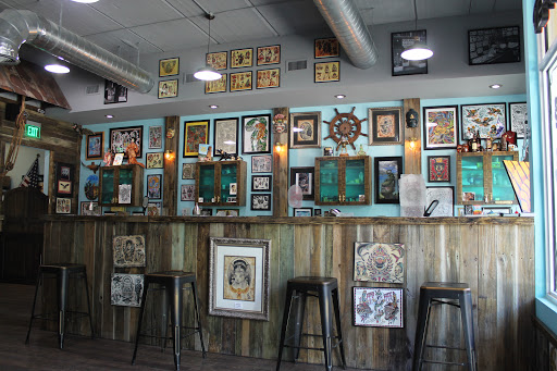 Explore bear tattoo ideas for men, creative tattoo ideas in Delray Beach, available at Vatican Tattoo Studio Delray