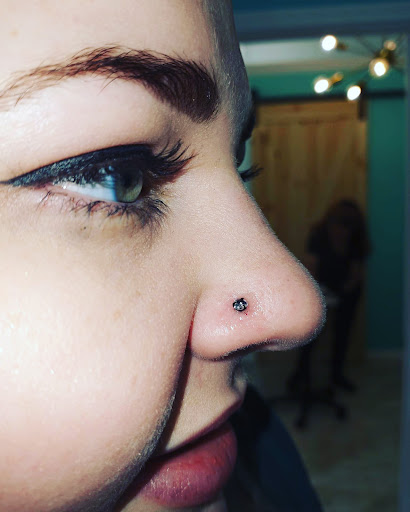 Explore dark side of the moon tattoo ideas, creative tattoo ideas in Webster, available at The Piercing Parlour