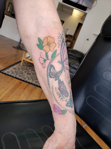 Explore band tattoo ideas, creative tattoo ideas in Platteville, available at Legacy Impressions Tattoos & Piercings
