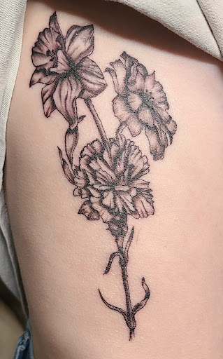 Explore lower belly tattoo ideas, creative tattoo ideas in Pahrump, available at Social Suicide Tattoos