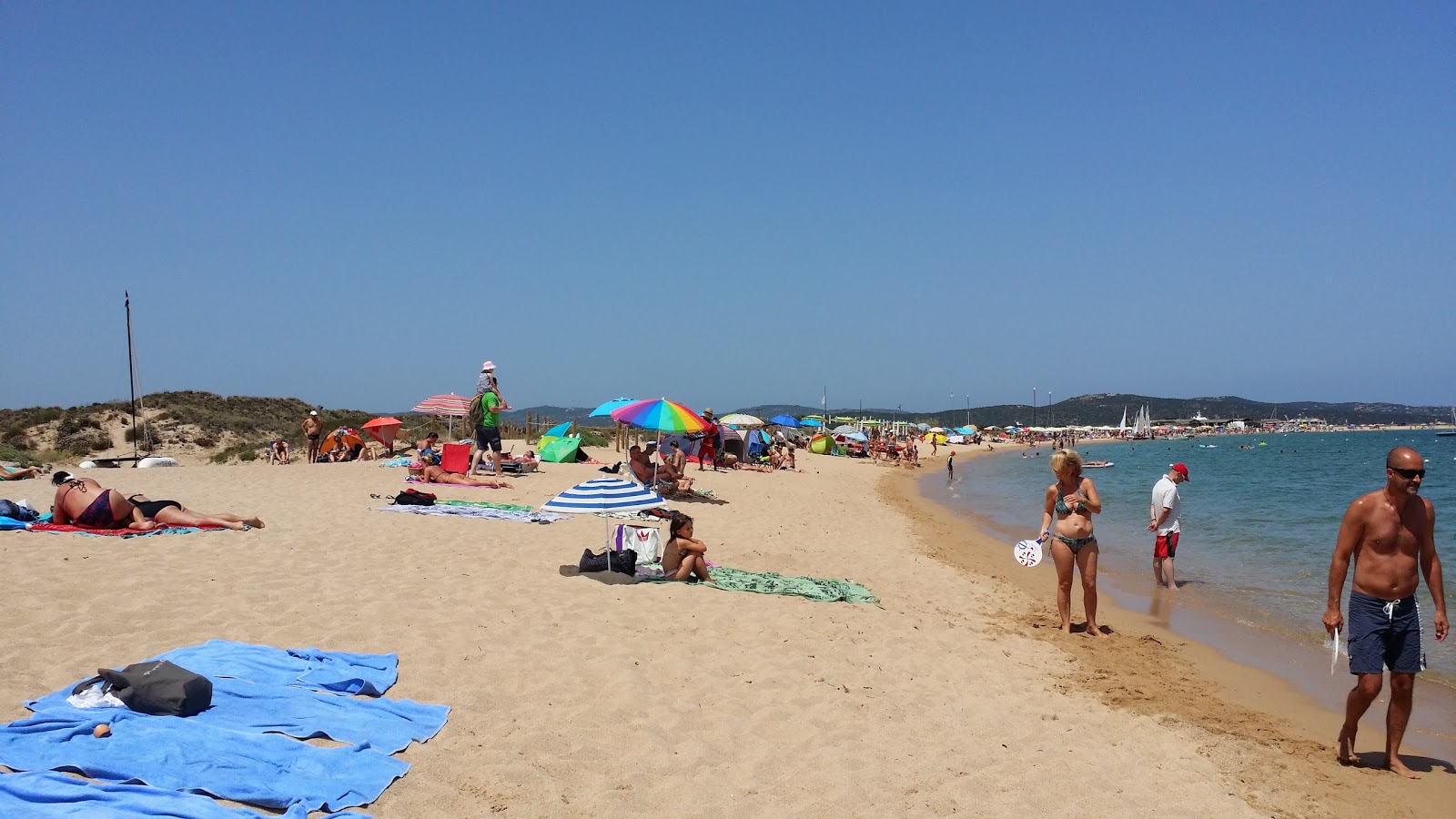 Foto von Spiaggia di Porto Pollo annehmlichkeitenbereich