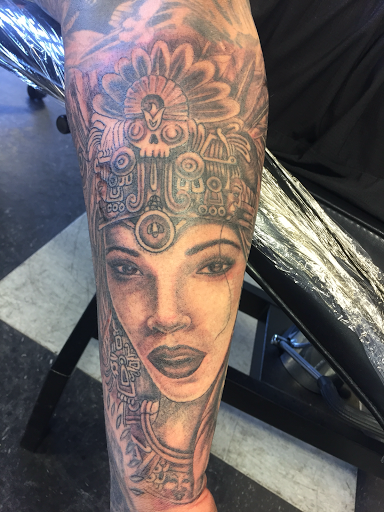 Explore photographer tattoo ideas, creative tattoo ideas in San Angelo, available at A1 Tattoos and Piercings