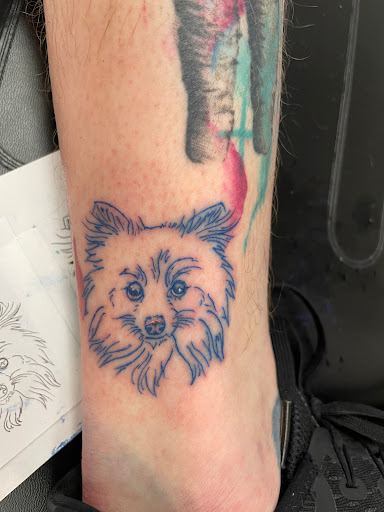 Explore simple flower tattoo ideas, creative tattoo ideas in Davenport, available at Fine Ink Studios Tattoos