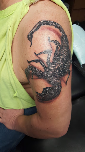 Explore gargoyle tattoo ideas, creative tattoo ideas in Hammond, available at Bugaboo Tattoo