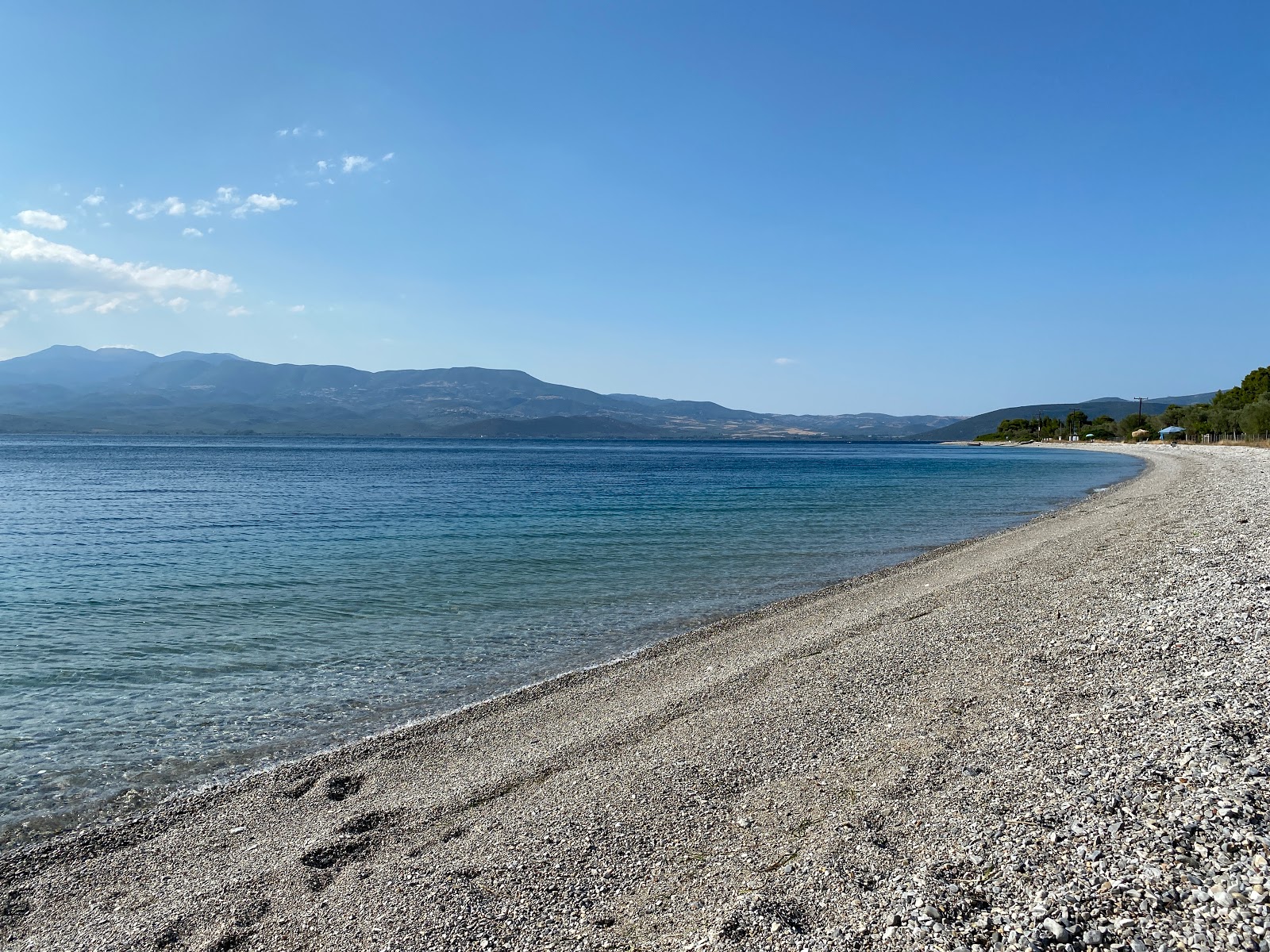 Fotografie cu Crocidas beach cu o suprafață de apă pură albastră