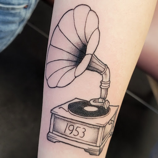 Explore angel of death tattoo ideas, creative tattoo ideas in Raleigh, available at Raleigh Tattoo Company