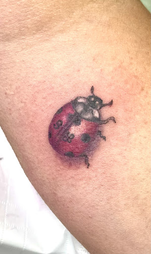 Explore mens tattoo ideas leg, creative tattoo ideas in Raleigh, available at Conspiracy Ink Tattoos