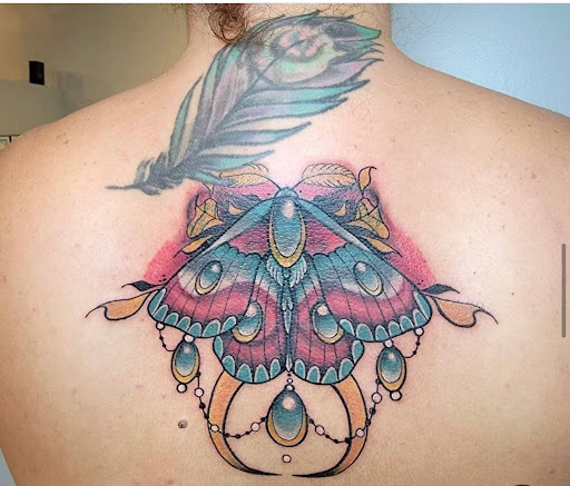 Explore butterfly foot tattoo ideas, creative tattoo ideas in Fort Wayne, available at Grade A Tattoos and Body Piercing