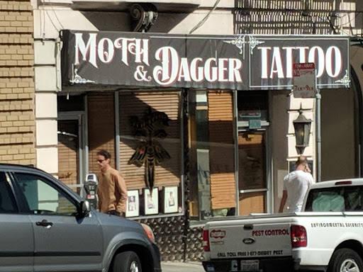 Moth and Dagger Tattoo Studio