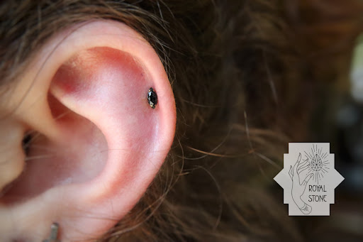 Explore cross tattoo ideas for females, creative tattoo ideas in Mobile, available at Royal Stone Piercing