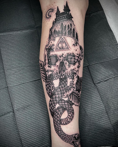 Explore arm tattoo ideas female, creative tattoo ideas in Johnson City, available at Gold Cross Tattoo Co.