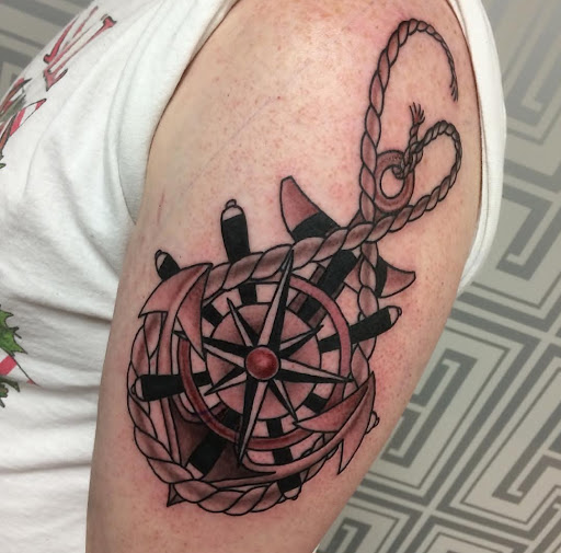 Explore tribal wolf tattoo ideas, creative tattoo ideas in Millsboro, available at Tattoo Galaxy (Millsboro) Piercing & Custom tattoos