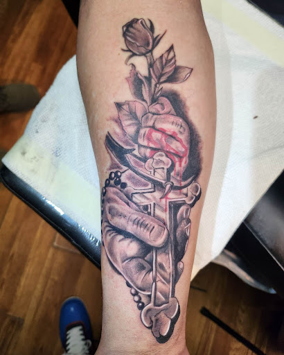 Explore small face tattoo ideas, creative tattoo ideas in Columbia, available at Nyce Tattoos