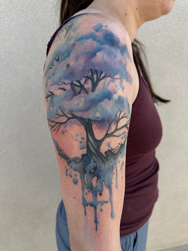 Explore two face tattoo ideas, creative tattoo ideas in Albuquerque, available at True Grit Tattoo