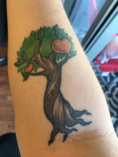 Find tattoo wedding band ideas for your next unique tattoo in New Port Richey at Modern Moose Studios Tattoos & Piercing