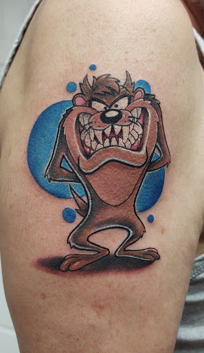 Explore initials tattoo ideas, creative tattoo ideas in Marietta, available at Monkeys Uncle Tattoo