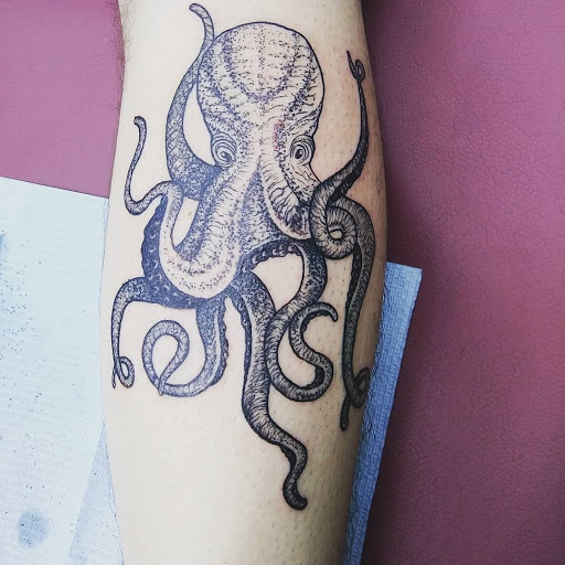 Explore small wave tattoo ideas, creative tattoo ideas in Calhoun, available at A Sailors Grave Tattoo Parlor