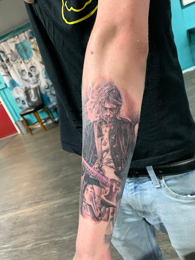 Explore atom tattoo ideas, creative tattoo ideas in Denver, available at level up tattoo co