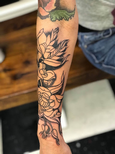 Explore good ideas for a cover up tattoo, creative tattoo ideas in New Cumberland, available at American Anchor Tattoo Co.