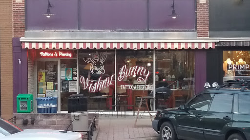 Explore honey bee tattoo ideas, creative tattoo ideas in Sioux Falls, available at Vishnu Bunny Tattoo and Piercing