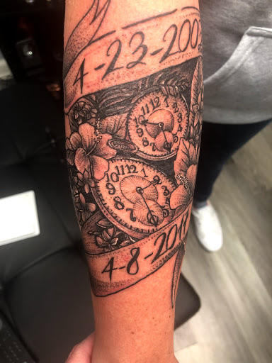 Explore moving tattoo ideas, creative tattoo ideas in Greenfield, available at Tattoos In Time Studio