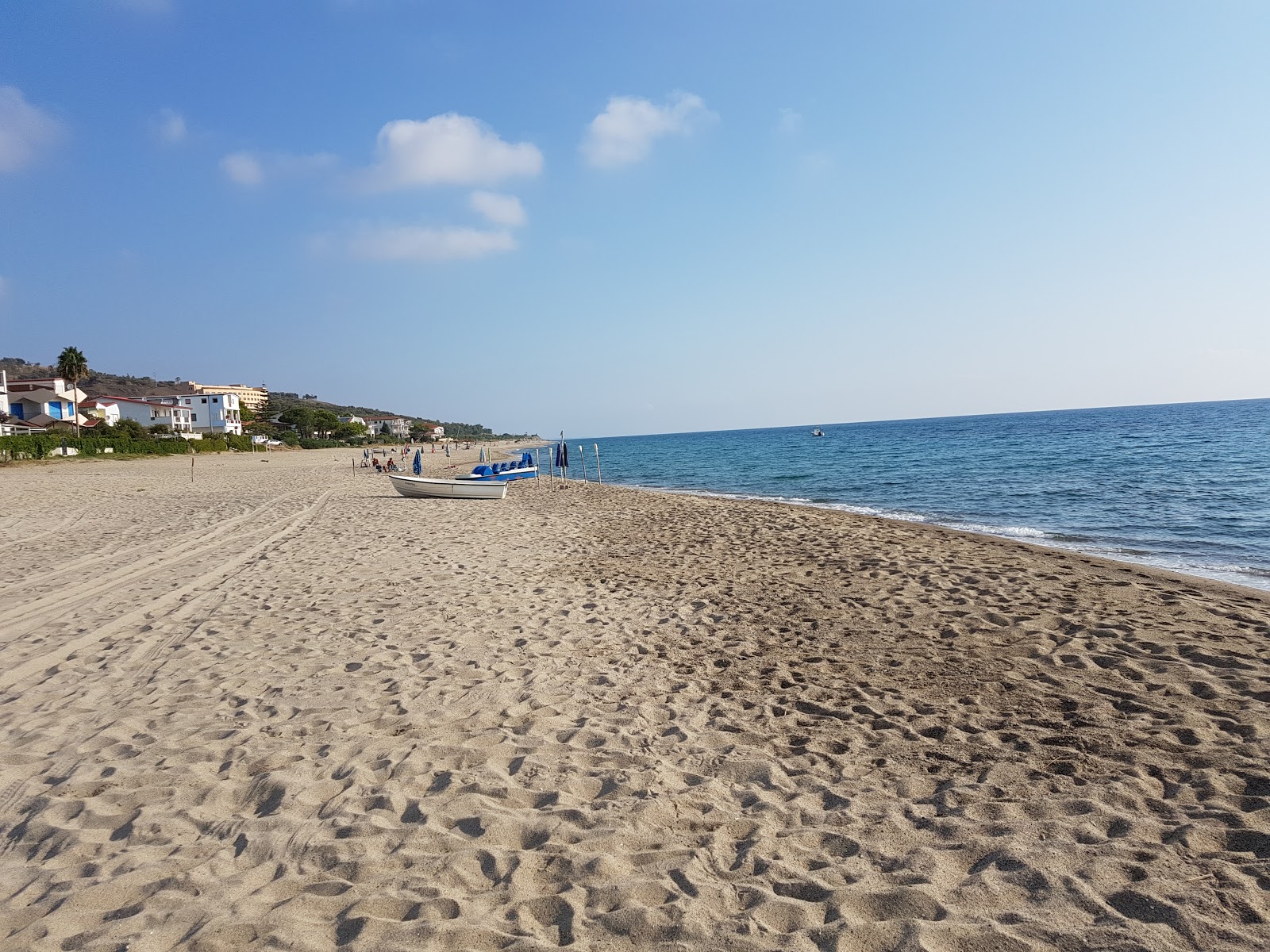 Photo de Tronca beach avec sable fin et lumineux de surface