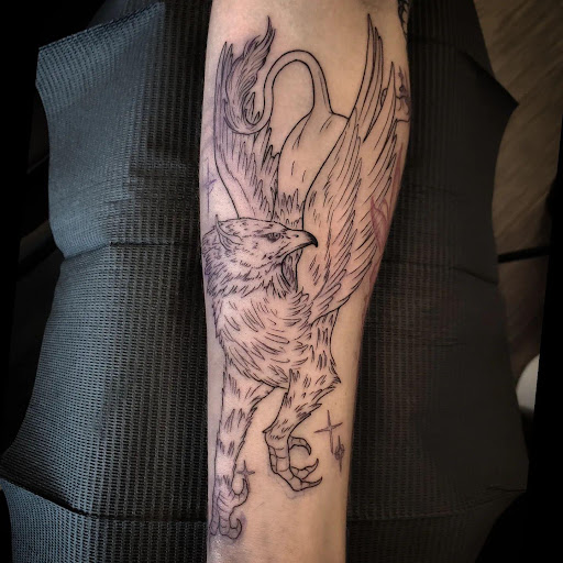 Explore formula 1 tattoo ideas, creative tattoo ideas in Palm Harbor, available at Angry Owl Tattoo and Piercing