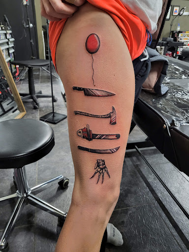 Explore fishnet tattoo ideas, creative tattoo ideas in Burlington, available at Lost Boys Tattoo & Piercing