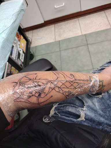 Explore cute flash tattoo ideas, creative tattoo ideas in Hampton, available at Blue Horseshoe Tattoo and Body Piercing