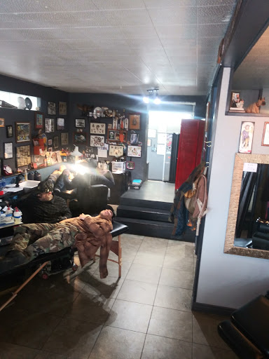 Explore father tattoo ideas for son, creative tattoo ideas in Grand Junction, available at Calamity Janes Tattoo & Piercing