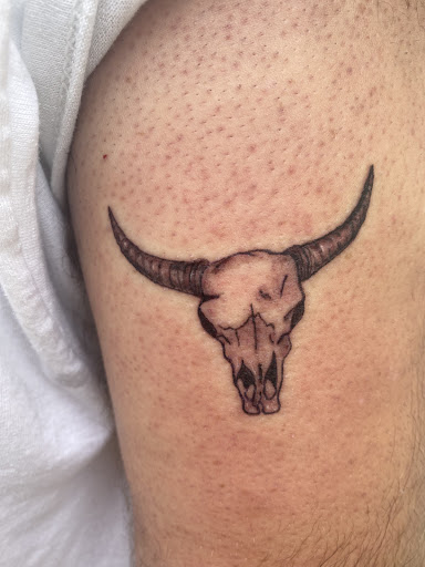 Explore cleavage tattoo ideas, creative tattoo ideas in Charlotte, available at Electric Ink Tattoo