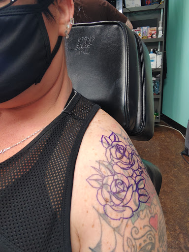 Explore dirtbike tattoo idea, creative tattoo ideas in Saint Charles, available at Threshold Body Art