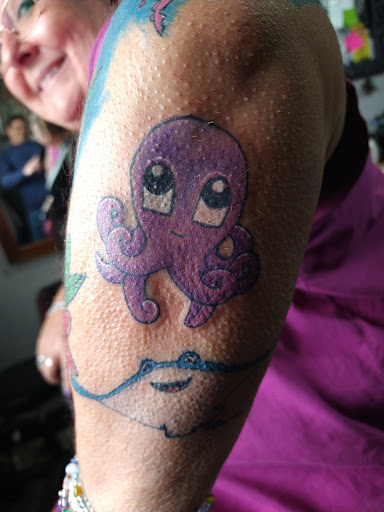 Explore live laugh love tattoo ideas, creative tattoo ideas in Elyria, available at Raven Ink Tattoo & Piercing