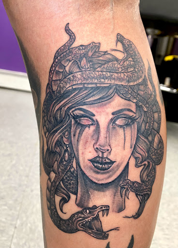 Explore woman arm tattoo ideas, creative tattoo ideas in Goshen, available at Lady Luck Studio