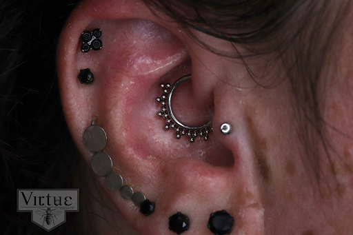 Explore black queen tattoo ideas, creative tattoo ideas in Ormond Beach, available at Virtue Studios