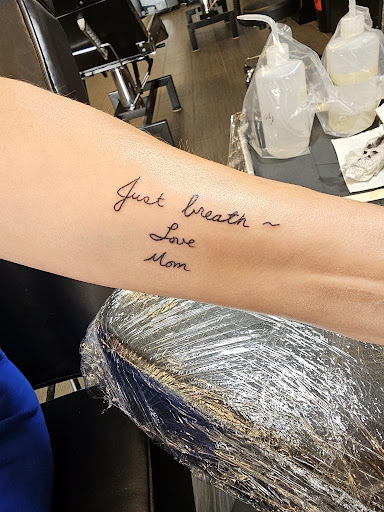 Explore flower name tattoo ideas, creative tattoo ideas in Palm Harbor, available at Angry Owl Tattoo and Piercing